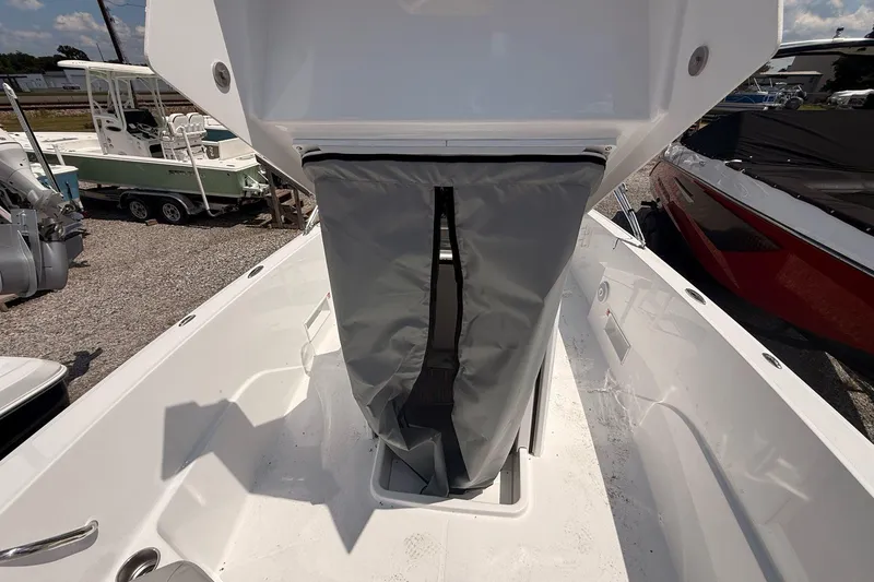 Slide: The Image of 2026 Wellcraft 202 Fisherman boat interior with storage compartment open. - 19