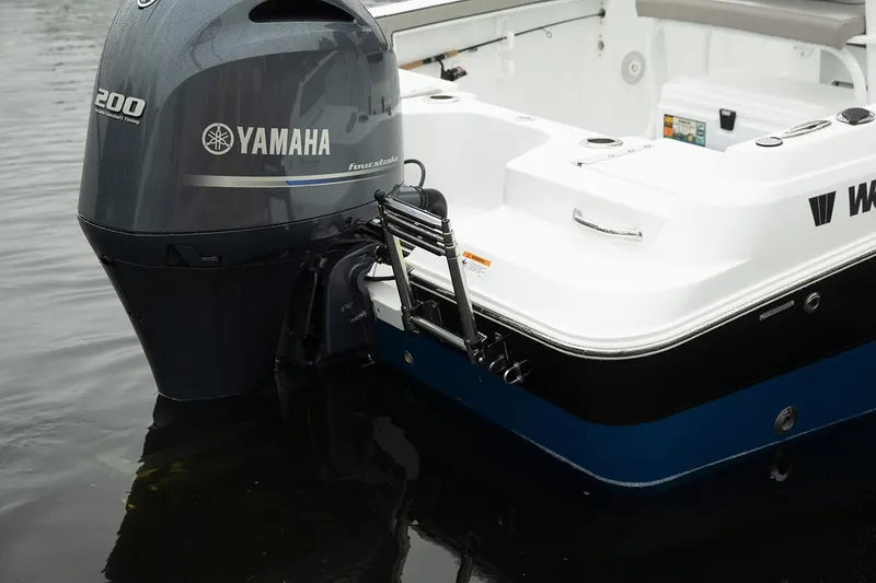 Slide: The Image of Manufacturer Provided Image: 2026 Wellcraft 202 Fisherman boat with Yamaha 200 engine, docked in water. - 29