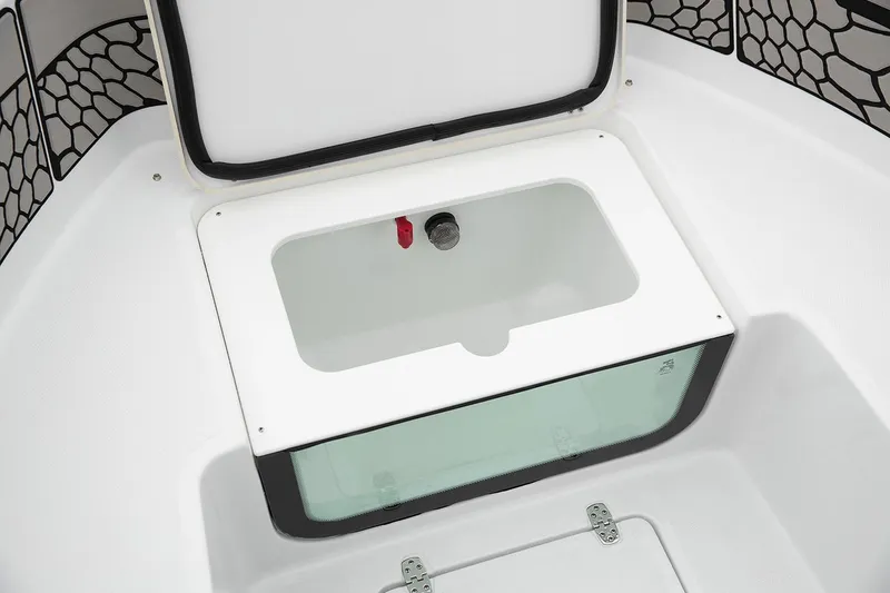 Slide: The Image of Manufacturer Provided Image: 2026 Wellcraft 202 Fisherman boat storage compartment with open lid, showcasing interior design. - 32