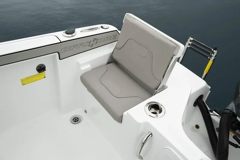 Slide: The Image of Manufacturer Provided Image: 2026 Wellcraft 202 Fisherman boat seat with cup holder, white and gray design. - 38