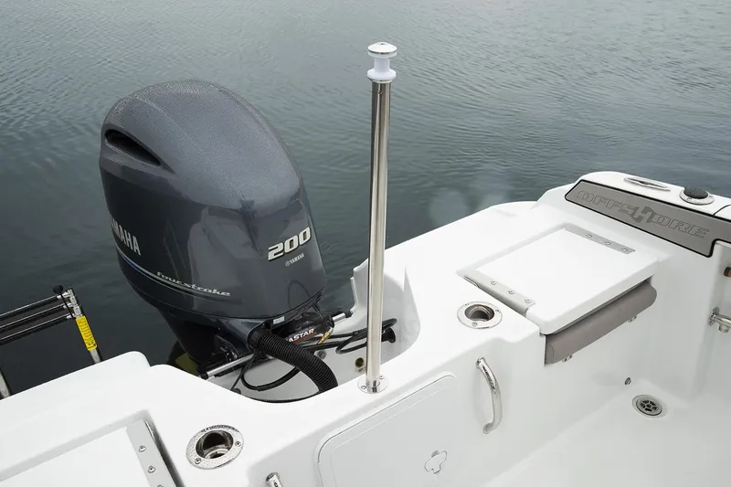 Slide: The Image of Manufacturer Provided Image: 2026 Wellcraft 202 Fisherman boat with Yamaha 200 outboard motor on calm water. - 39