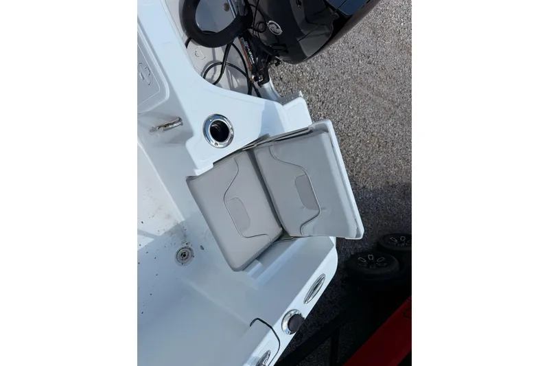 Slide: The Image of 2026 Wellcraft 202 Fisherman boat seat and console detail, showcasing modern design. - 9
