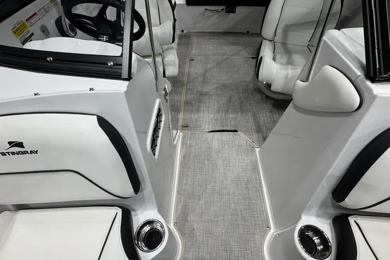 Slide: The Image of Interior of 2026 Stingray 191 DC boat with sleek seating and modern design. - 14