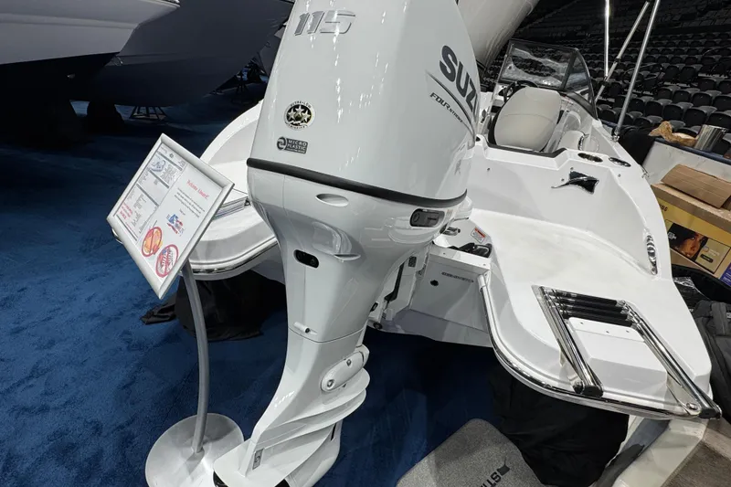 Slide: The Image of 2026 Stingray 191 DC boat with Suzuki outboard motor on display. - 3