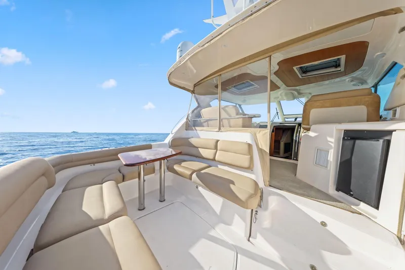 Slide: The Image of 2008 Tiara Yachts 4300 Sovran interior with seating area and ocean view. - 17