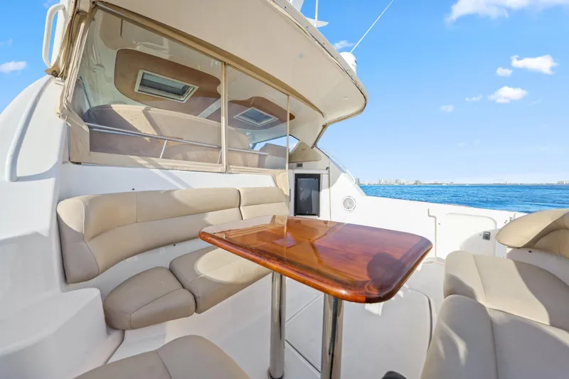 Slide: The Image of 2008 Tiara Yachts 4300 Sovran interior with seating and table, ocean view. - 19