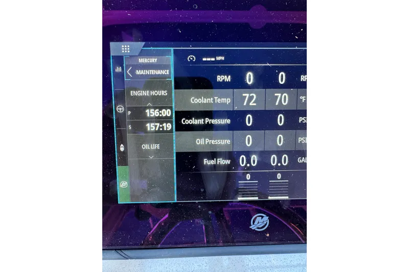 Slide: The Image of Display screen of a 2025 Intrepid 327 Cuddy showing engine maintenance data. - 13