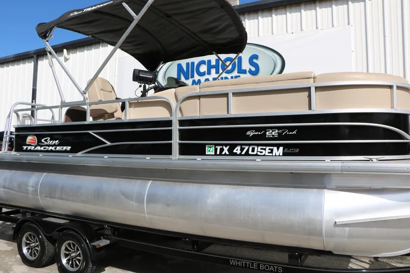 Slide: The Image of 2019 Sun Tracker SportFish 22 XP3 pontoon boat with canopy, displayed at Nichols Marine. - 12