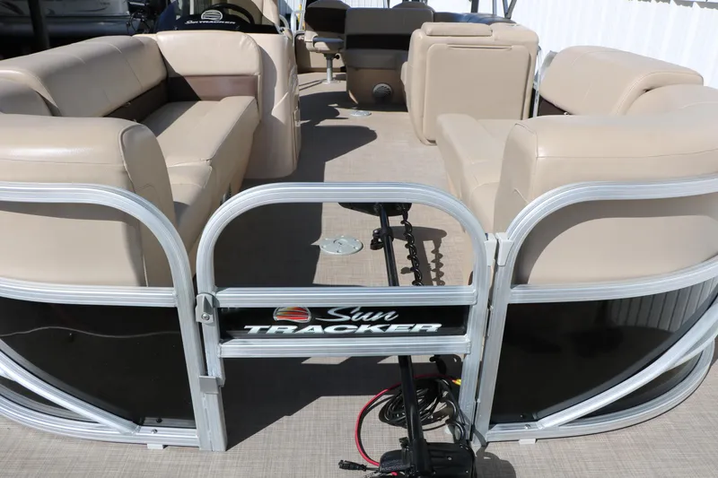 Slide: The Image of 2019 Sun Tracker SportFish 22 XP3 pontoon boat with beige seating and open deck. - 16