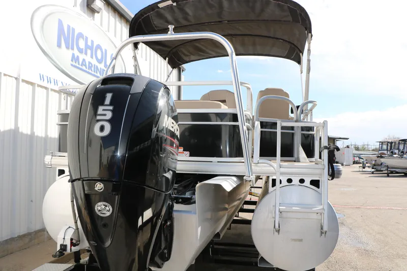 Slide: The Image of 2019 Sun Tracker SportFish 22 XP3 pontoon boat with Mercury 150 engine at marina. - 7