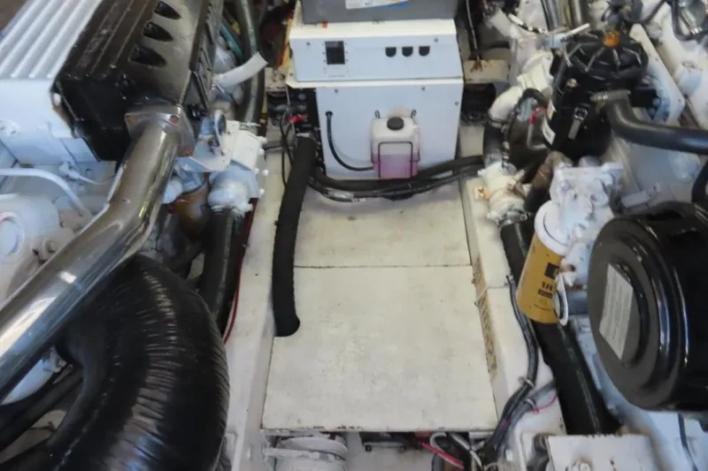 Slide: The Image of Engine room of a 2001 Tiara Yachts 4300 Open, showcasing mechanical components and systems. - 20