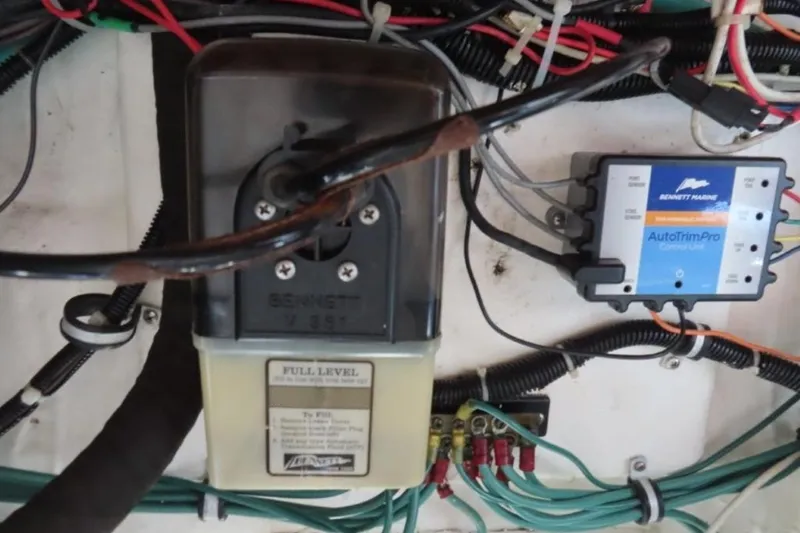 Slide: The Image of Electrical components and wiring inside a 2001 Tiara Yachts 4300 Open boat. - 21