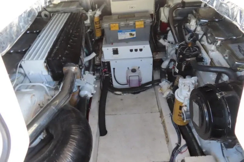 Slide: The Image of Engine room of 2001 Tiara Yachts 4300 Open, showcasing mechanical components and systems. - 22