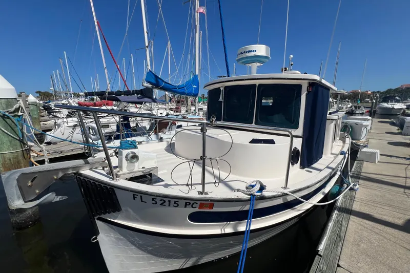 Slide: The Image of Nordic Tug 26 (1993) boat deck with storage compartment and window. - 11
