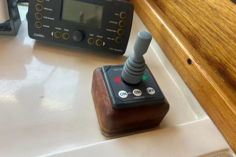 Slide: The Image of 1993 Nordic Tug 26 electrical panel with generator and shore power options. - 46