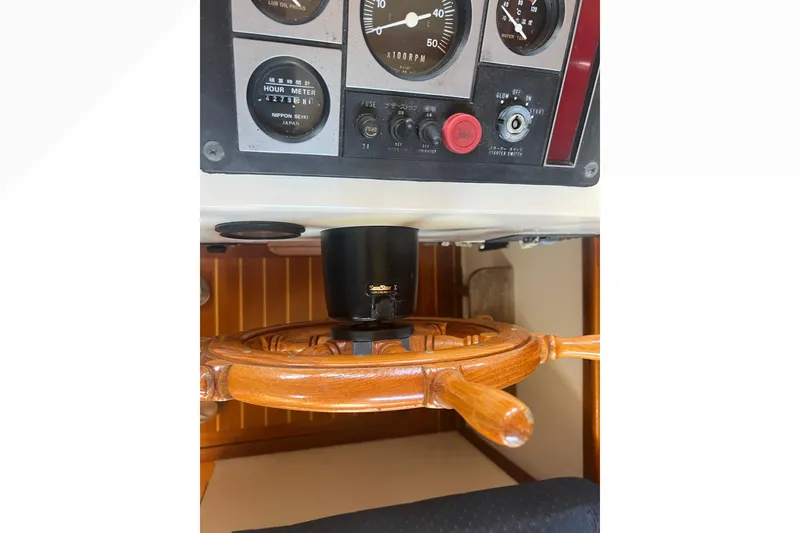 Slide: The Image of Gauge displaying fuel consumption in gallons per hour on a 1993 Nordic Tug 26. - 53