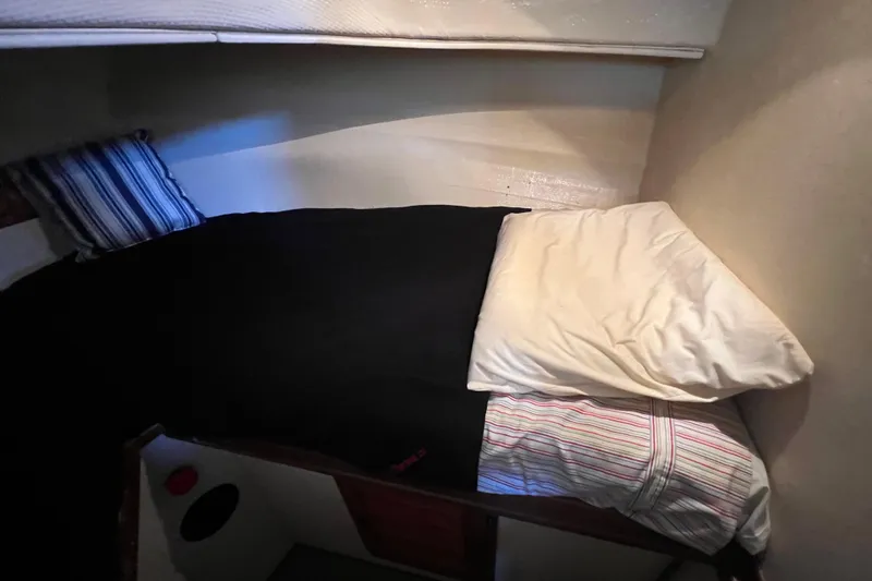 Slide: The Image of Wooden louvered door inside 1993 Nordic Tug 26 boat cabin. - 71