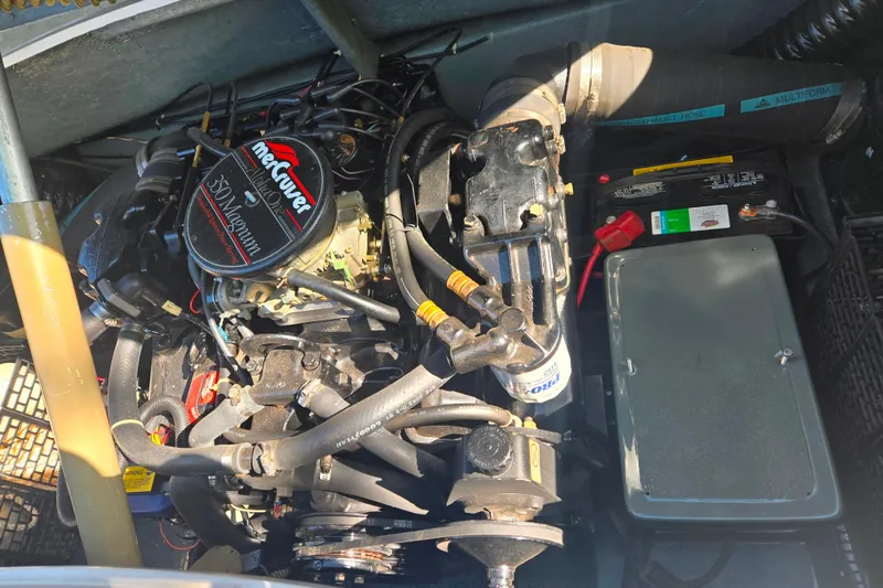 Slide: The Image of Engine compartment of a 1987 Sea Ray Pachanga 22 with MerCruiser 350 Magnum engine. - 30