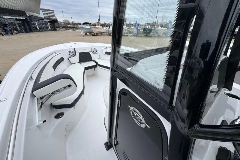 Slide: The Image of 2026 Tidewater 220 LXF boat interior with seating and modern design. - 12