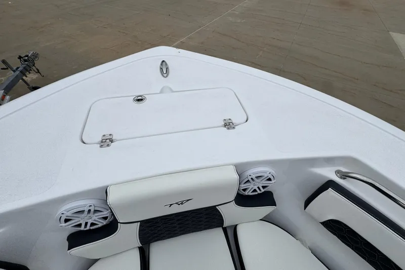 Slide: The Image of 2026 Tidewater 220 LXF boat bow with seating and speakers. - 15