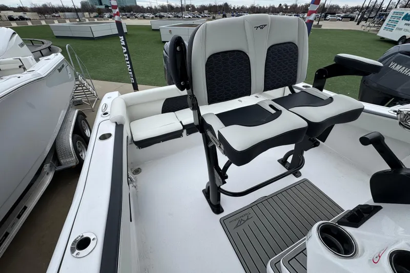 Slide: The Image of 2026 Tidewater 220 LXF boat interior with dual seating and modern design. - 19