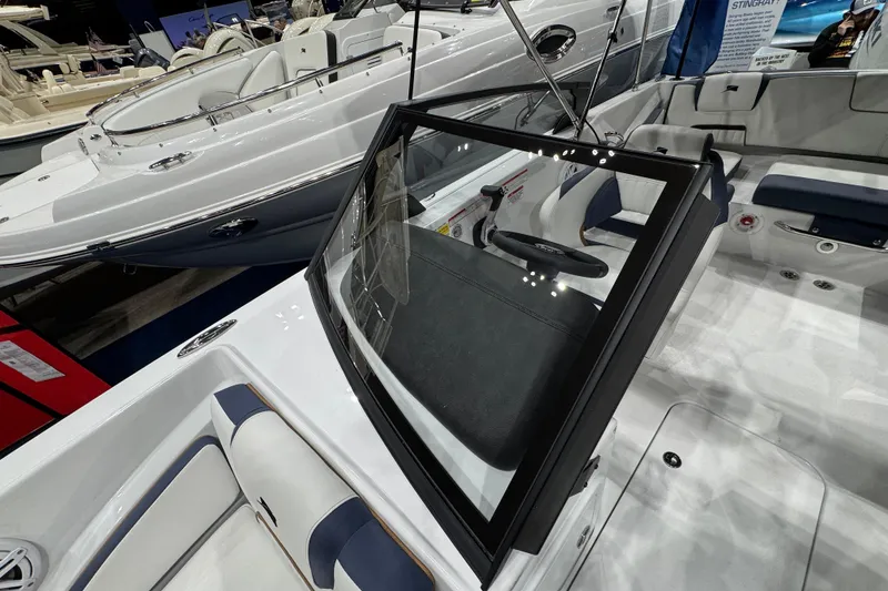 Slide: The Image of 2026 Stingray 20 SBX boat interior with sleek design and modern seating arrangement. - 20