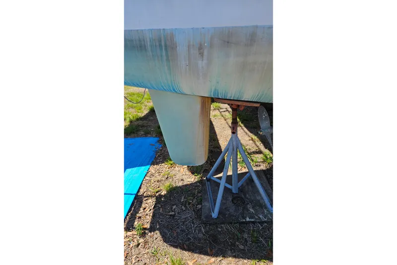 Slide: The Image of Bottom view of a 1996 PDQ 32 LRC catamaran hull on a stand. - 37