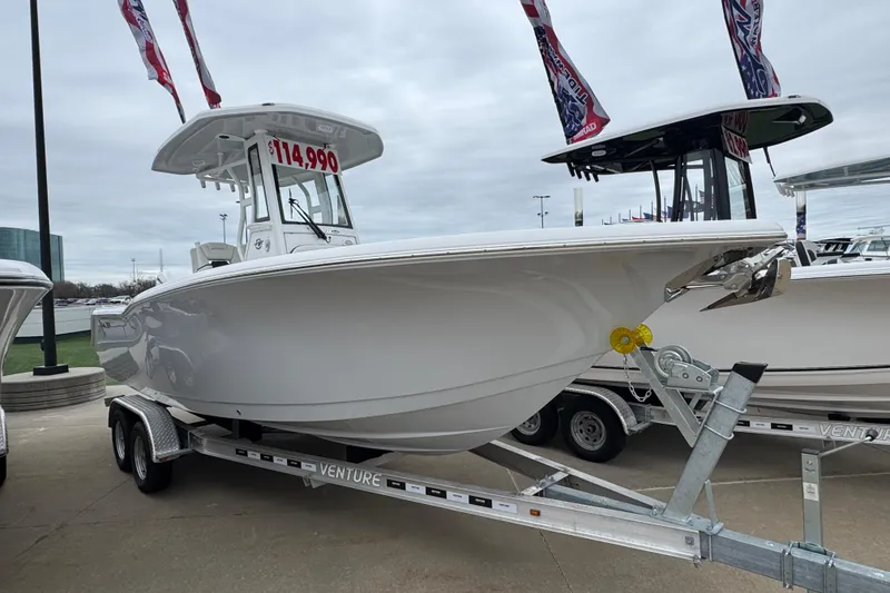 The Image of 2026 Tidewater 232 CC Adventure boat on trailer, priced at $114,990. - 1