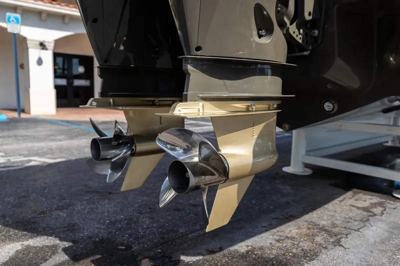 Slide: The Image of Close-up of 2023 Airship 310 boat propellers on a trailer in a parking lot. - 15