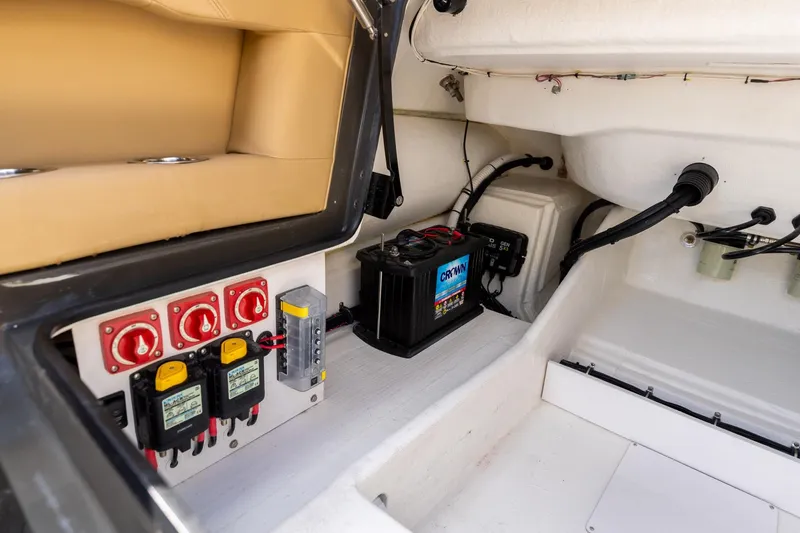 Slide: The Image of Electrical system of 2023 Airship 310 boat, featuring battery and control panel. - 25