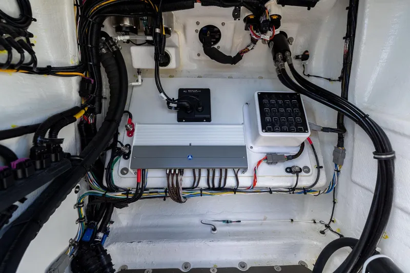 Slide: The Image of Electrical system inside 2023 Airship 310 model, showcasing wiring and control panel. - 40