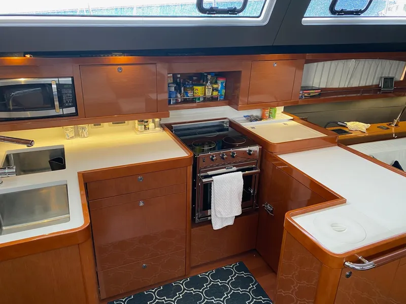 Slide: The Image of Luxurious kitchen interior of 2016 Beneteau Oceanis 60 yacht with modern appliances. - 11