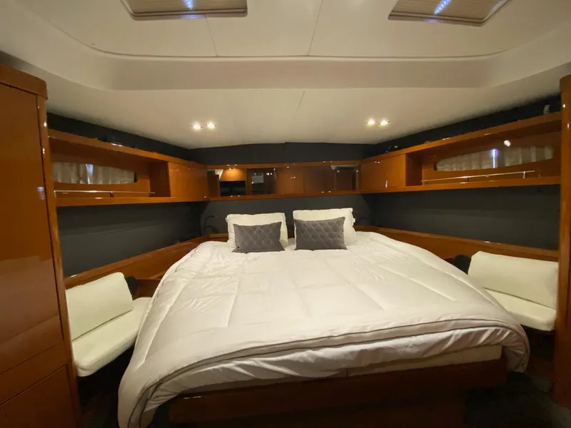 Slide: The Image of Luxurious cabin interior of 2016 Beneteau Oceanis 60 yacht with cozy bedding. - 13