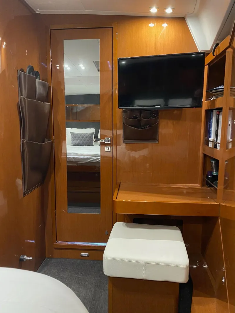 Slide: The Image of Luxurious interior of 2016 Beneteau Oceanis 60 yacht with wood finish and modern amenities. - 15