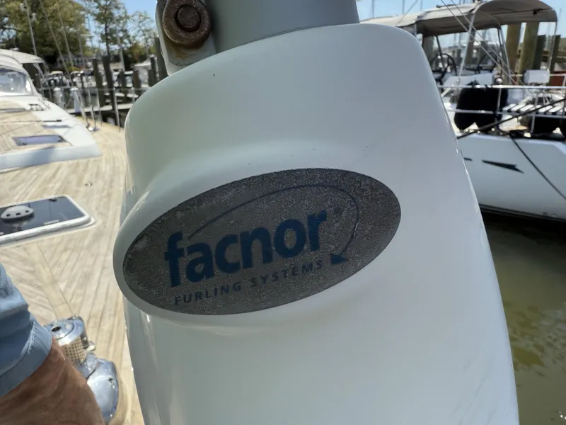 Slide: The Image of Facnor furling system on a 2016 Beneteau Oceanis 60 sailboat at a marina. - 29