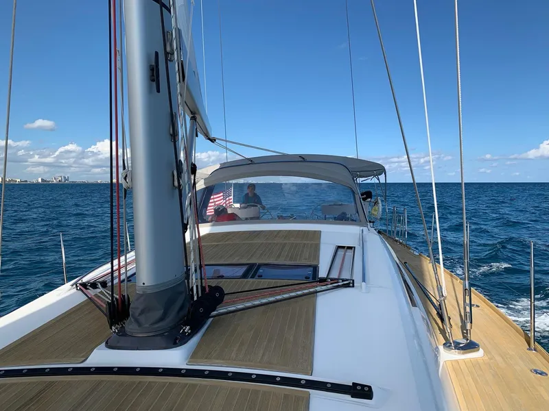 Slide: The Image of Beneteau Oceanis 60 sailing on open sea, 2016 model, clear skies, calm waters. - 30