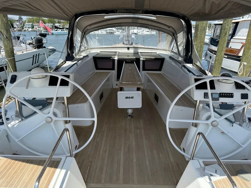 Slide: The Image of Beneteau Oceanis 60 yacht cockpit, dual steering wheels, 2016 model, docked at marina. - 34