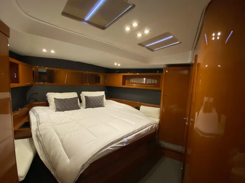 Slide: The Image of Luxurious cabin interior of 2016 Beneteau Oceanis 60 yacht with cozy bedding. - 4
