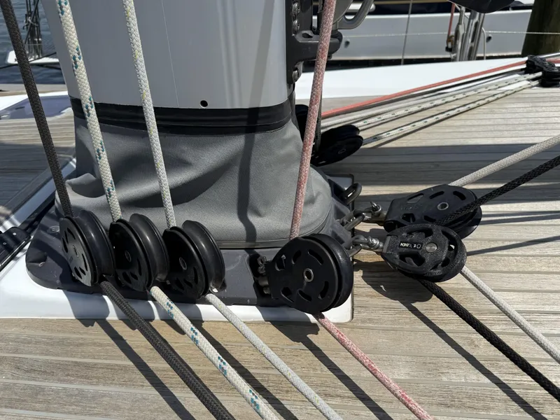 Slide: The Image of Rigging and pulleys on a 2016 Beneteau Oceanis 60 sailboat deck. - 41