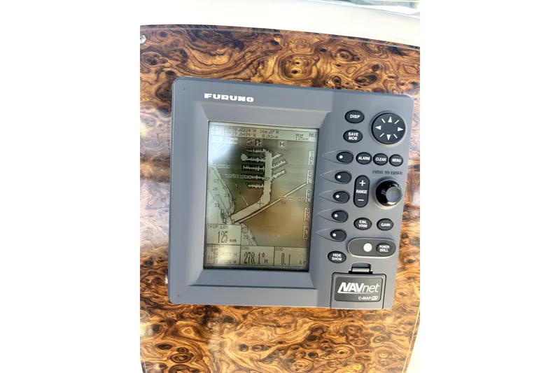 Slide: The Image of Furuno NAVnet marine GPS system on 2002 Bayliner 3488 Avanti boat dashboard. - 25