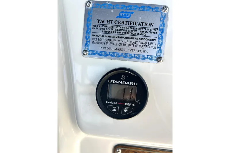 Slide: The Image of Yacht certification plaque and depth gauge on 2002 Bayliner 3488 Avanti. - 32