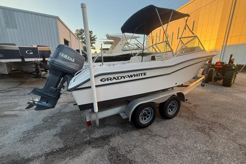 Slide: The Image of 1997 Grady-White Tournament 192 boat with Yamaha outboard motor on trailer. - 10