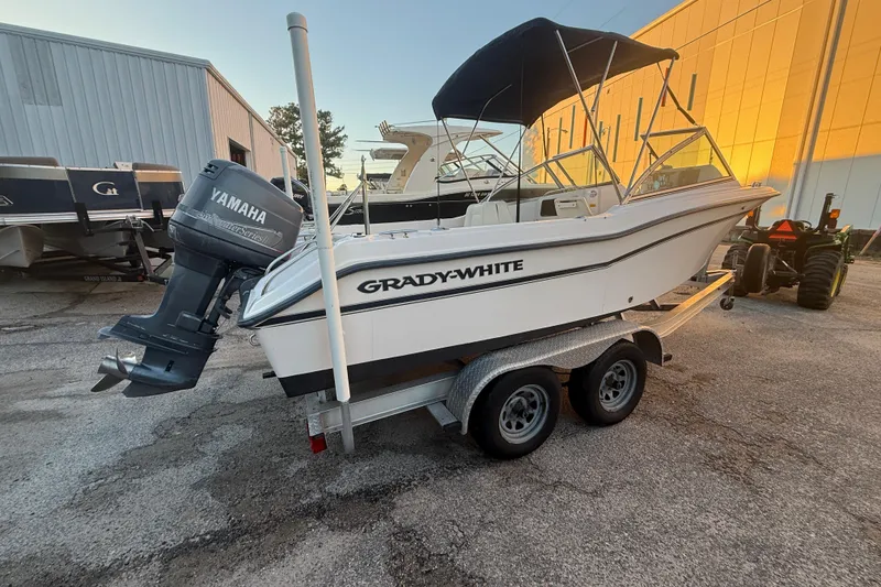 Slide: The Image of 1997 Grady-White Tournament 192 boat with Yamaha outboard motor on trailer. - 11