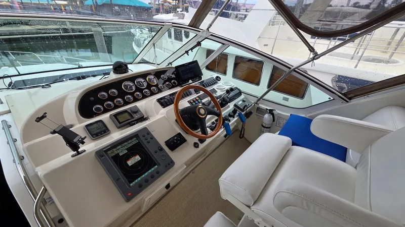 Slide: The Image of Interior view of a 2000 Cruisers Yachts 4450 Express Motoryacht cockpit. - 19