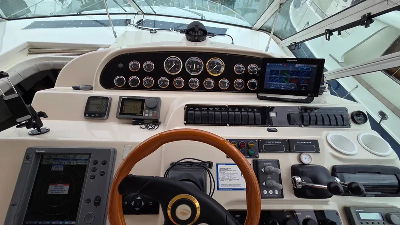 Slide: The Image of Cockpit of the 2000 Cruisers Yachts 4450 Express Motoryacht. - 22