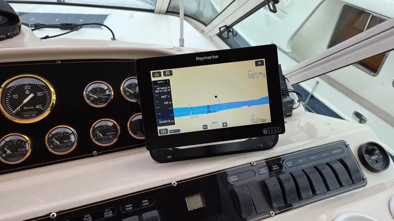 Slide: The Image of Dashboard of 2000 Cruisers Yachts 4450 Express Motoryacht with navigation system. - 23