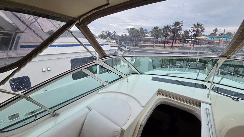 Slide: The Image of Interior view of 2000 Cruisers Yachts 4450 Express Motoryacht in rainy weather. - 27