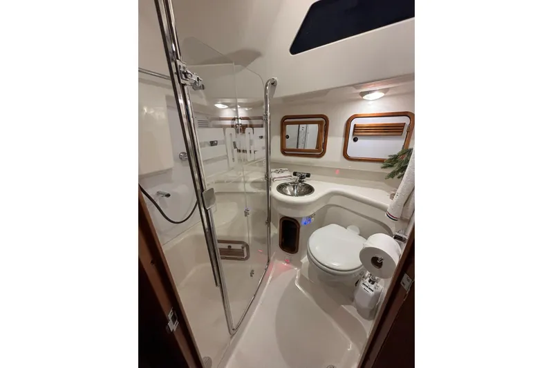 Slide: The Image of Luxurious yacht bathroom with shower, sink, and toilet in C&C 110, 2000 model. - 5