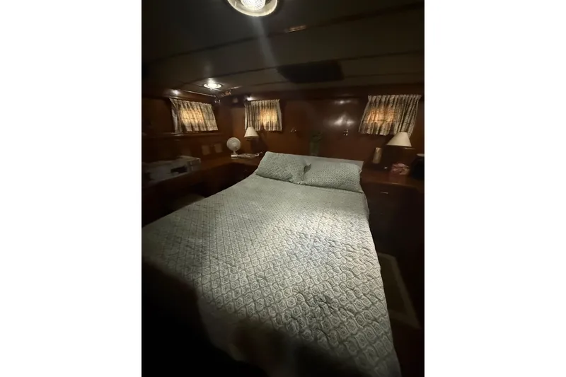 Slide: The Image of Cozy bedroom interior of 1983 Ocean Alexander 43 Flush Aft Deck yacht. - 11