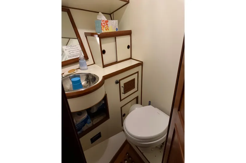 Slide: The Image of Bathroom interior of 1983 Ocean Alexander 43 Flush Aft Deck yacht. - 7